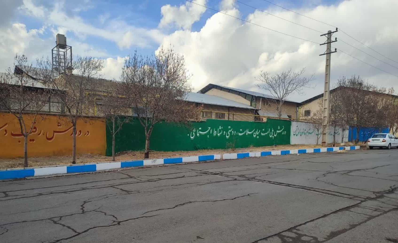 زیباسازی دیوار اداره ورزش و جوانان با مضامین ورزشی