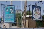 نصب بنر به مناسبت سالروز اقامه نخستین نماز جمعه پس از پیروزی انقلاب اسلامی