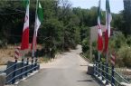 اهتزاز پرچم های ایران بر فراز پل جدید محله کولج بالا